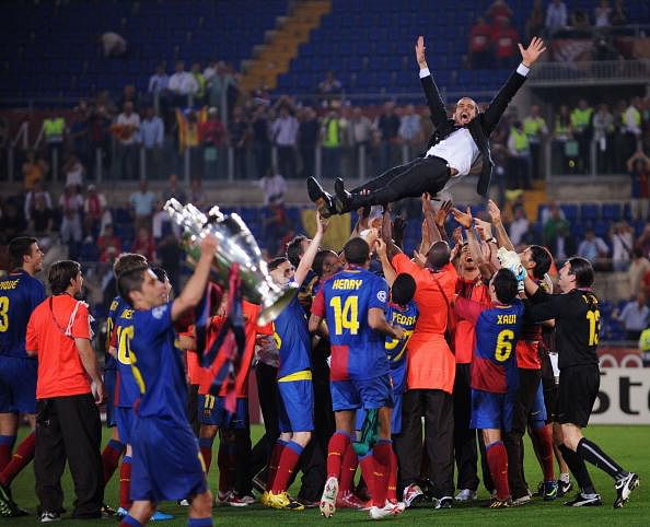 ROME - MAY 27: Barcelona's Guardiola is thrown into the air by his players as they celebrate winning the UEFA Champions League Final match against Manchester United at the Stadio Olimpico, in Rome, Italy.
